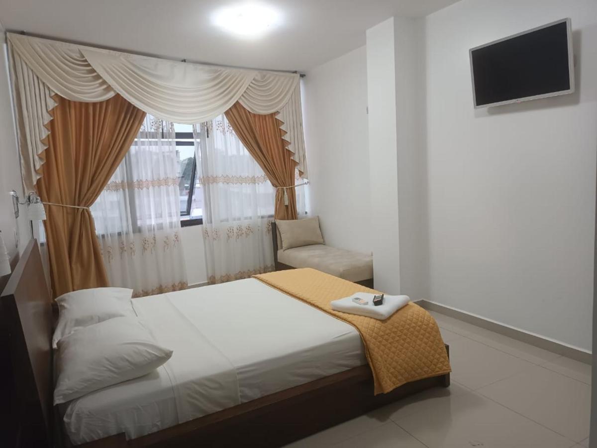 Hotel Quezada Hermanos 圣多明各德洛斯科罗拉多斯 外观 照片