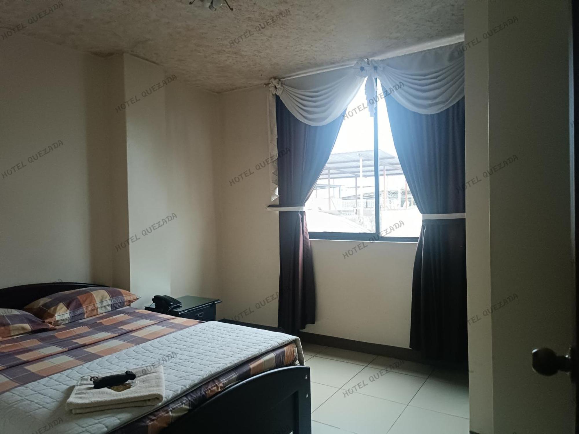 Hotel Quezada Hermanos 圣多明各德洛斯科罗拉多斯 外观 照片